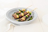 Grilled potato and beef skewers