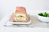 Potato terrine with goat's cheese and hazelnuts