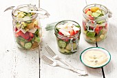 Chicken salad with strawberries, green beans, potatoes and cucumber