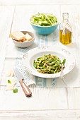 Courgette strips with mint pesto, pine nuts and Parmesan