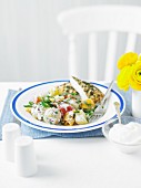 Potato salad with vegetables and chicken escalope with a herb crust