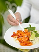 Sweet and sour prawns with rice