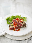 Peppercorn crust tuna steaks with tomato salsa