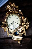 Gilt, vintage wall clock with rose motifs