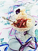 Vanilla ice cream with rhubarb sauce and violets