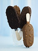Chocolate-covered ice cream sticks with milk and dark chocolate