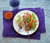 Pork skewers with rice and mange tout (Thailand)