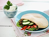Stuffed pita bread with minced meat and vegetables