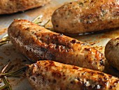 Sausages with rosemary (close-up)