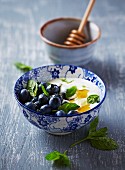 Blueberries with yogurt, honey and mint
