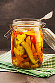 A jar of pickled vegetables