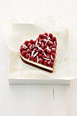 A heart-shaped raspberry cake