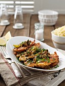 Chicken escalope with lemon and capers