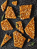 Salted brittle with rosemary and pine nuts