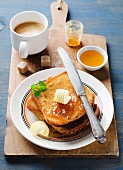 French toast with butter and jam served with coffee