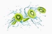 Slices of kiwi with a splash of water