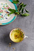 Elderflower tea in a floral-patterned cup
