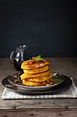Pumpkin pancakes with honey nuts and maple syrup