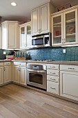 Cabinets and appliances in domestic kitchen