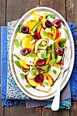 Courgette salad with nectarines, cherries and chilies