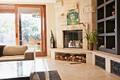 Contemporary living room with sofa, fireplace and built in shelving; Dana Point; California; USA