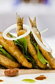 Sarde alla triestina (sardine sandwich with lettuce leaves, Italy)