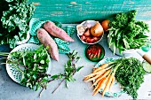 An arrangement of vegetables and herbs