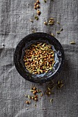 Cumin and coriander seeds in a bowl