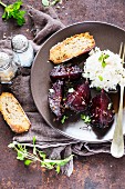 Fried beetroot with herbs and rice