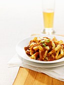 Poutine – chips and cheese covered in gravy (Canada)