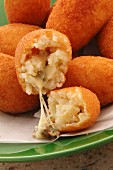 Arrancini di riso filled with cheese (close-up)