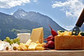 Zillertaler Heumilchkäse (cheese made from silage-free milk) – An arrangement of Graukäse, Bergtilsiter and Kirchtagskäse (Tyrol, Austria)