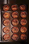 Apple tarts in baking tins