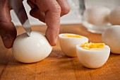 Halving boiled eggs