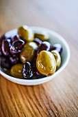 Marinated olives in a small bowl