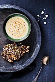 Pumpkin soup with pepper and wholemeal bread