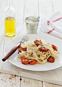 Homemade tagliatelle with roasted cherry tomatoes and thyme