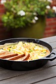 Scrambled eggs with salmon and spring oinons