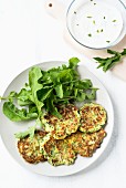 Courgette cakes with a rocket salad