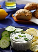 Tzatziki with cucumbers, olives and lemons