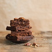 A stack of pecan nut chocolate brownies