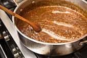 Gravy in a saucepan on a hob