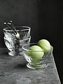 Green apple sorbet in a glass bowl