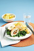 Sun-dried tomato-stuffed chicken with creamed spinach