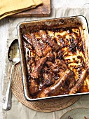 Spare ribs in a spicy orange and honey sauce