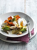 Caesar salad with chicken, bacon and poached egg