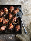 Pheasant rolls with dried plums and bacon