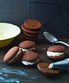 Chocolate whoopie pies filled with cream