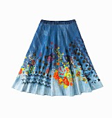 A two-tone, blue denim skirt with a colourful floral print