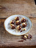 Homemade confectionery: walnut and apricot balls
